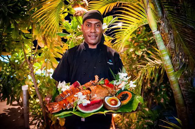 Our chef with a fresh Fijian lobster